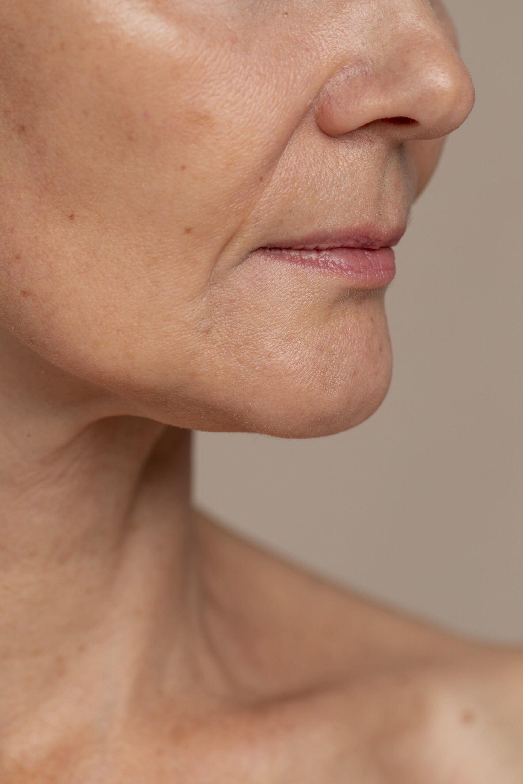 Illustrative image: A woman applying serum to her skin