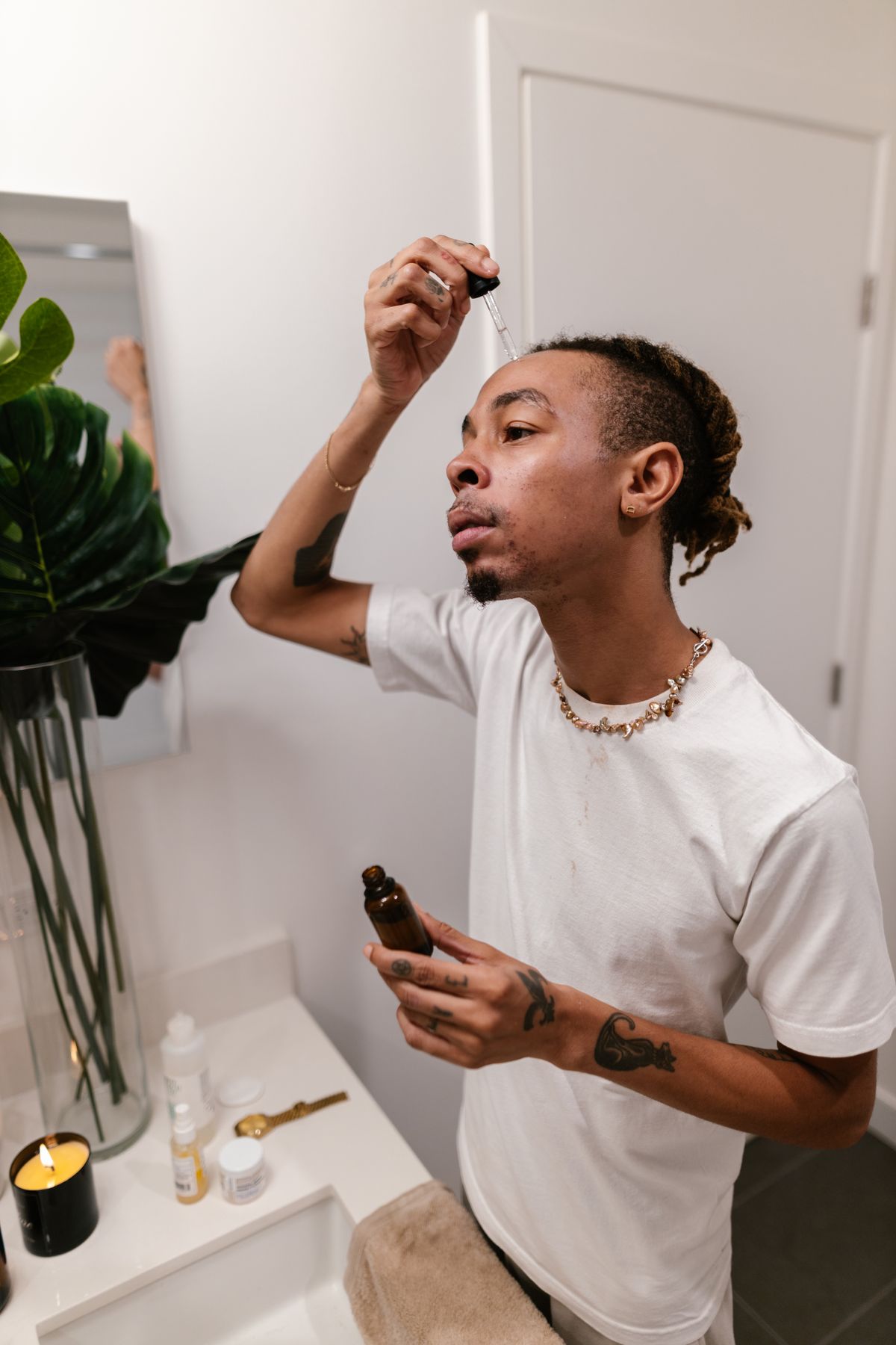 Illustrative image: A man applying serum during his skincare routine