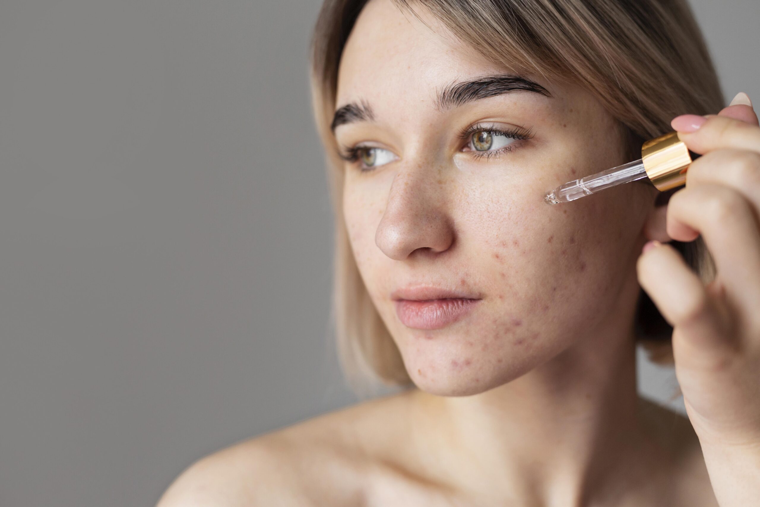 Illustrative image: A man applying serum during his skincare routine